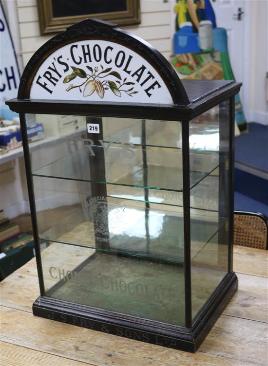 A Frys chocolate advertising cabinet with printed opaque glass pediment
